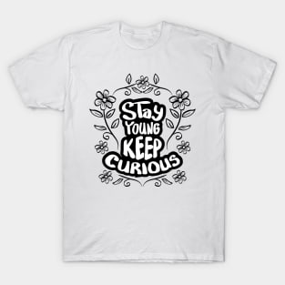 Stay young stay curious hand lettering. Motivational quote. T-Shirt